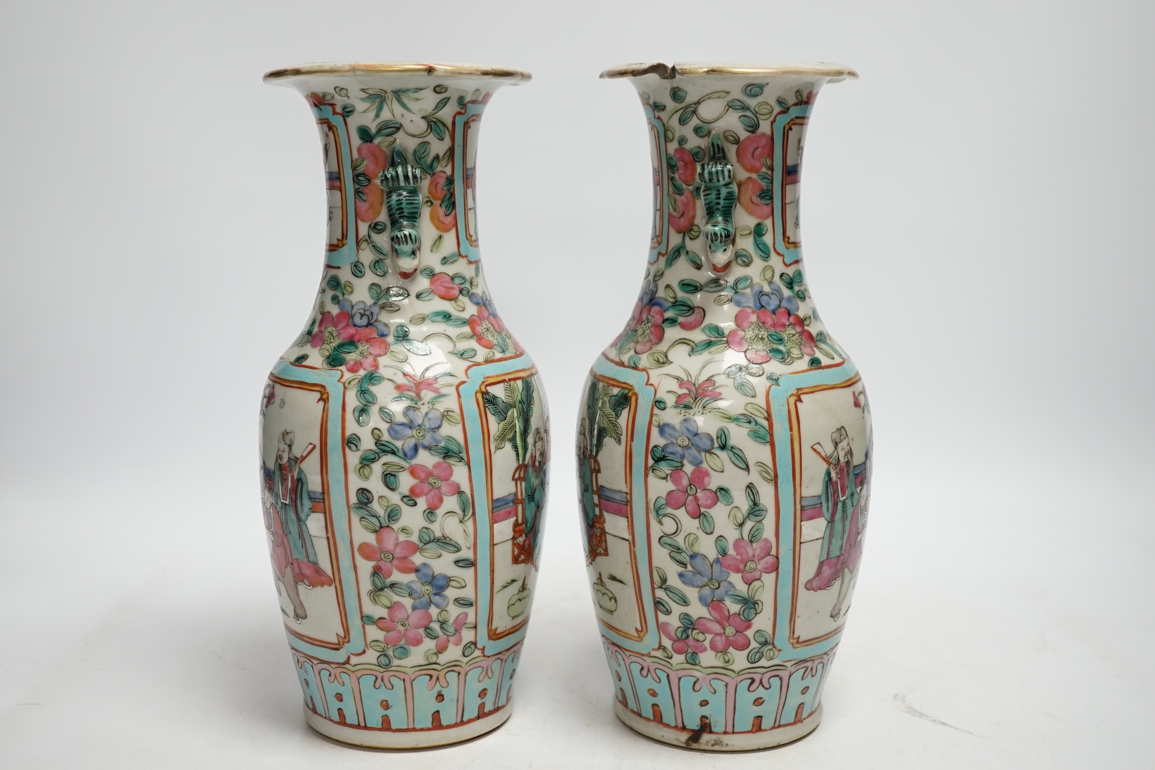 A pair of 19th century Chinese famille rose vases, 25cm high